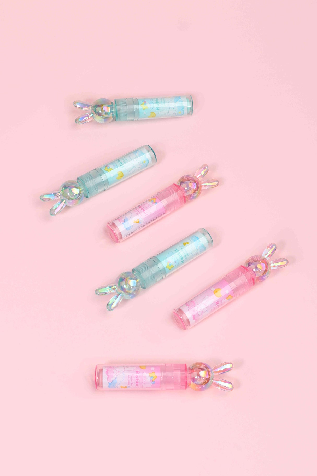 7953 Borrador Kuki conejo turquesa y rosado